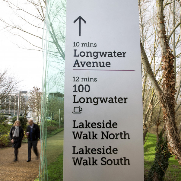 Endpoint's wayfinding design - directional sign showing the time to different locations