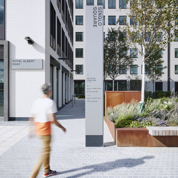 London's Royal Albert Dock - visitor using Endpoint's wayfinding totem